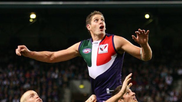 Dockers big man Aaron Sandilands flies for a mark in the win against Carlton at Subiaco Oval.