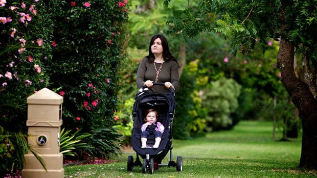 House bound... without an eruv Sindy Lowinger and her daughter, Tova, cannot push the pram outside the house on the Sabbath.
