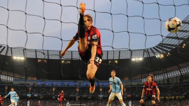 Craig Dawson of West Bromwich Albion unsuccessfully tries to stop Manchester City's opening goal.