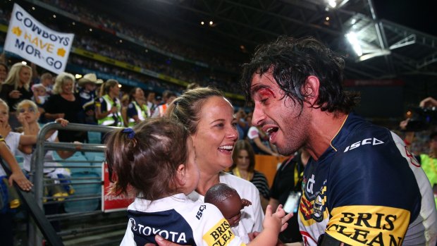 Frankie's doll: Johnathan Thurston, his partner Samantha Lynch, daughter Frankie and her doll after the grand final.