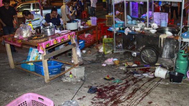 Grim aftermath: The scene of the attack in eastern Thailand.