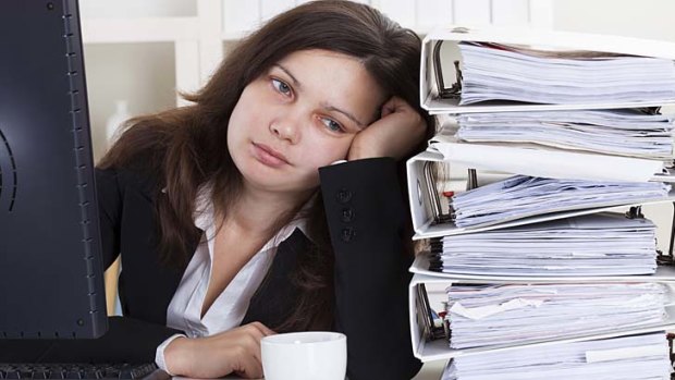 Counter productive: The average employee wastes 50 minutes a day on work that will either be binned or not used.