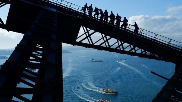 Harbour bridge pass ... everything was coming up blue yesterday morning when NSW Origin legends climbed the Sydney Harbour Bridge.