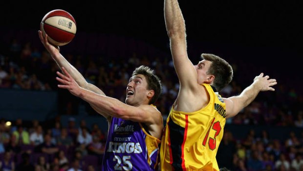 Jesse Sanders of the Kings lays the ball up against the Melbourne Tigers in round one.