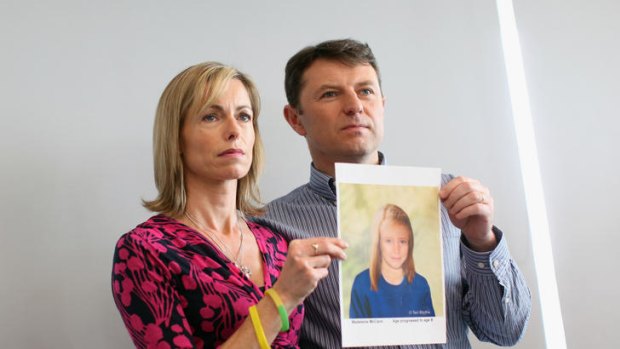 Kate and Gerry McCann holding an age-progressed police image of their daughter during a news conference to mark the 5th anniversary of the disappearance of Madeleine McCann, on May 2, 2012 in London, England.