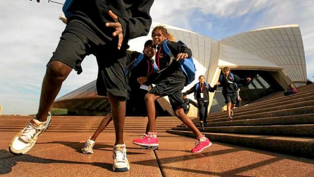Stories to tell, in Sydney and back home: The Tjuntjuntjara students take in the Sydney Opera House and its surroundings.