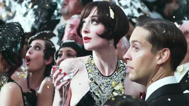 Jordan, (Elizabeth Debicki) and Nick, (Tobey Maguire) at one of Gatsby's parties.