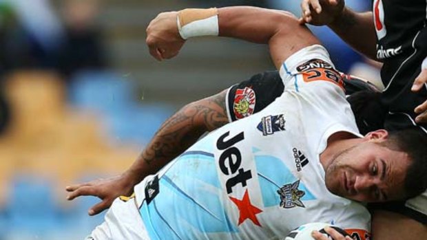 Bodene Thompson of the Titans charges forward during the round 21 NRL match between the Warriors and the Titans.