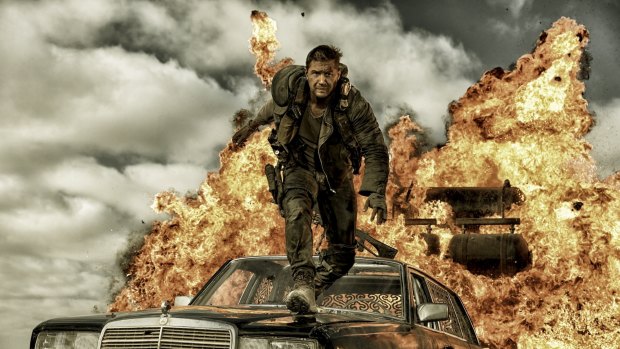 <i>Fury Road</i> features explosive action, ridiculous vehicles and surreal, post-apocalyptic desert back drop.