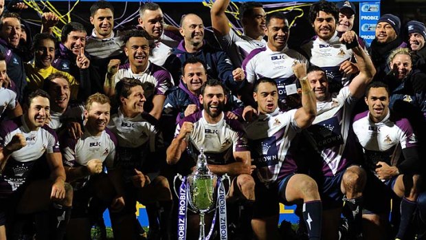Champions again: Melbourne Storm players celebrate their win in the World Club Challenge against the Leeds Rhinos at Headingley.