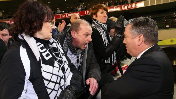 A Collingwood fan tells the club's president, Eddie McGuire, a home truth or two after the big defeat.