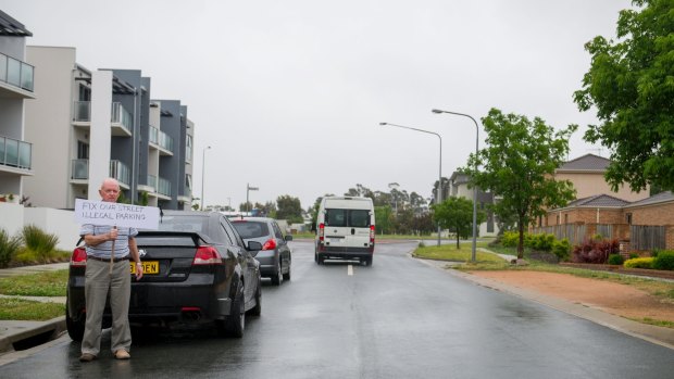An example of how parked cars are forcing vehicles on to the wrong side of the street, potentially in the path of oncoming traffic exiting Flemington Road.