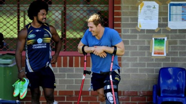 Morale boost: Injured Brumbies star David Pocock has a laugh with teammates.