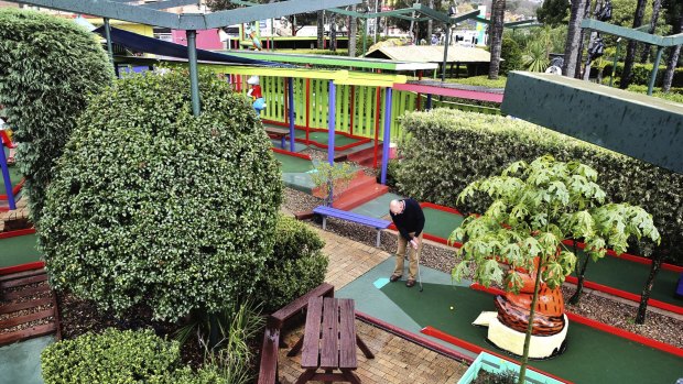Vale affordable fun: Putt putt enthusiast Tony Smith on Thursday at the Ermington course, now under threat from developers. 