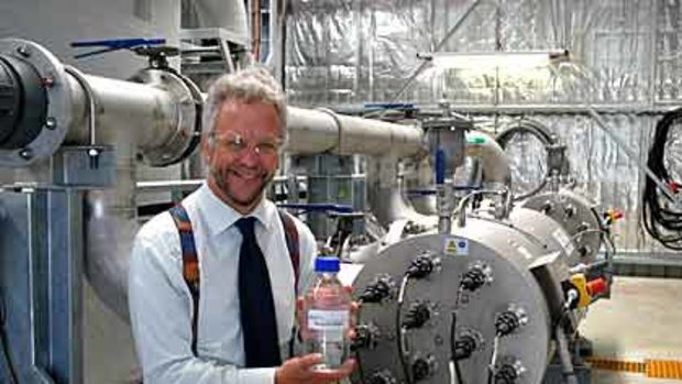 Water Corporation's water source planning manager Nick Turner with a bottle of recycled water.