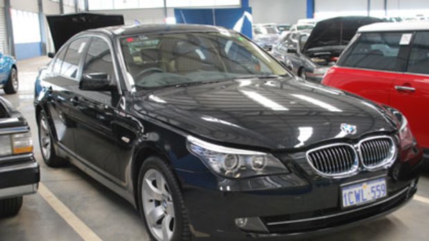 The Oswals' 2008 black sapphire BMW 5-Series. The highest bid came to just over $55,000.