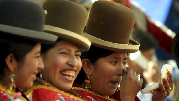 Hats on ... women at this year's Gran Poder parade, La Paz's biggest festival.