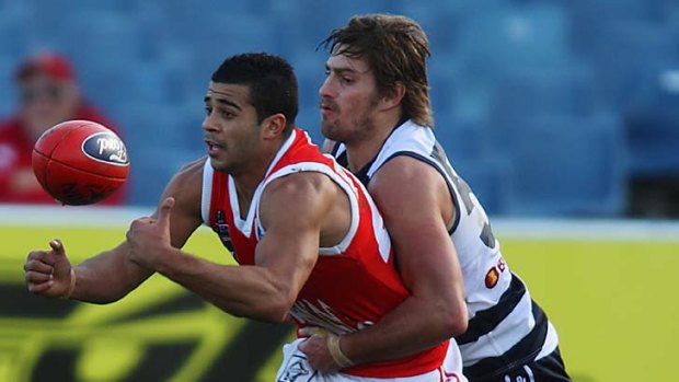 Ahmed Saad battles with a Geelong opponent in the VFL this year.