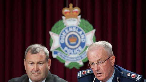 Police Minister Jack Dempsey (left) and Police Commissioner Bob Atkinson (right) speak with members of the media about the Gold Coast shooting.