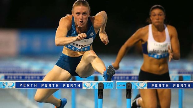 Sally Pearson competes in the women's 100 metre hurdles during the Perth Track Classic at the WA Atheletics Stadium on Saturday.
