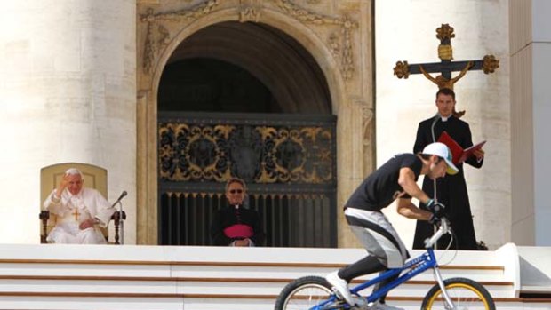 The pontiff was entertained by a Spanish acrobatic cyclist in celebrations as a prelude to the main event tomorrow.