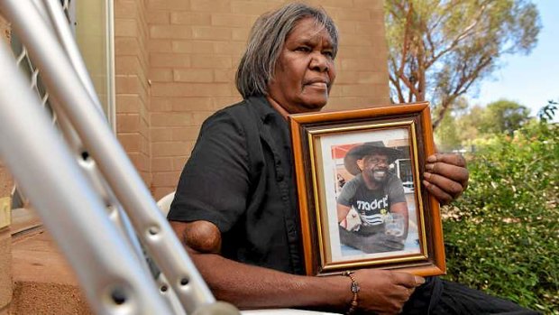 "They can't just do what they did and forget about it": Therese Ryder with a portrait of her son Kwementyaye.