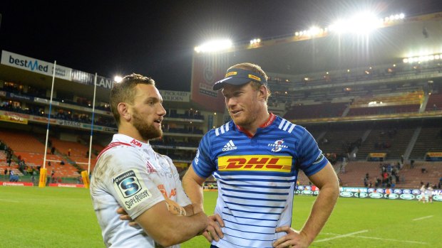 Shooting the breeze: Schalk Burger and Aaron Cruden speak after their Super Rugby quarter-final in Cape Town.