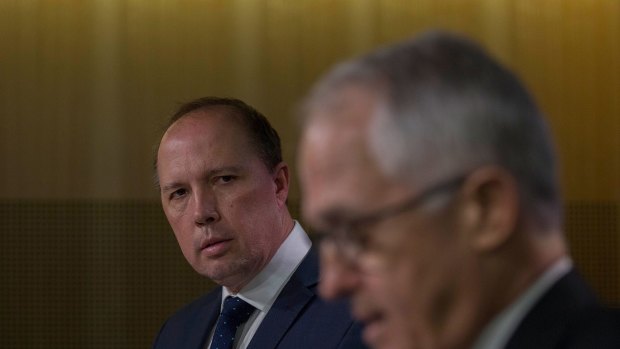 Malcolm Turnbull and Immigration Minister Peter Dutton announce changes to refugee immigration.