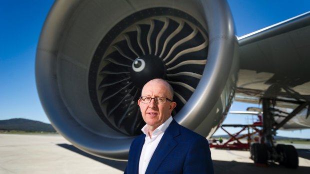 Airport Chief Stephen Byron is worried about flight reductions and cancellations from Sydney. 