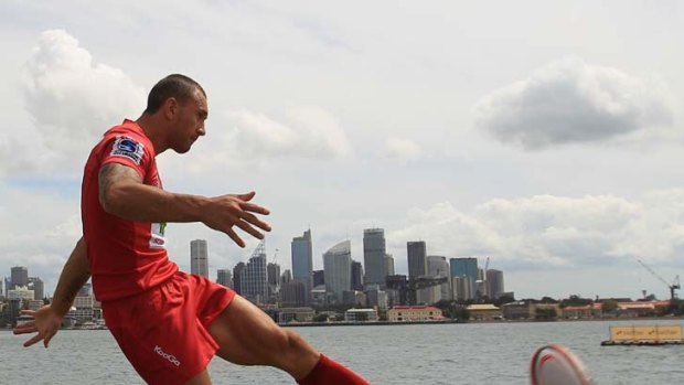 Rebooted &#8230; rejuvenated Reds five-eighth Quade Cooper at Sydney Harbour as his Queensland side prepare to take on the Waratahs in the first round of the Super Rugby season.