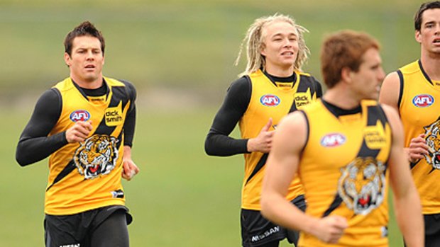 Ben Cousins trains with the Tigers yesterday. Although he was keen to play at the weekend, coach Damien Hardwick said the veteran midfielder would have to cool his heels on the sidelines.