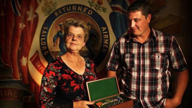 In honour: Sergeant Brett Wood's mother, Alison Jones, holds his military medals with his best friend, Iain McLaren. He was killed on his third tour of duty in Afghanistan.