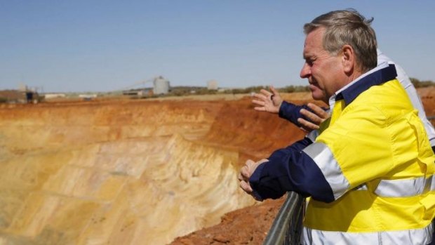 WA Premier Colin Barnett has fired a shot across the bows of mining giants Rio Tinto and BHP Billiton.