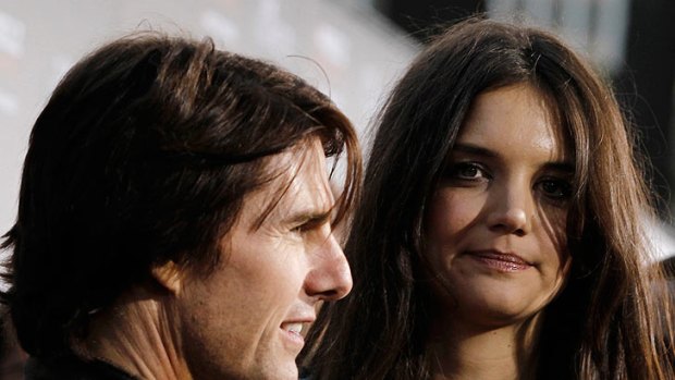 Cruise accompanies his wife on the red carpet at the 2011 premiere of The Kennedys,  in which she starred.