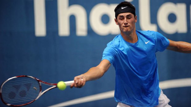 Bernard Tomic of Australia plays a shot as against Guillermo Garcia-Lopez of Spain at the Thailand Open.
