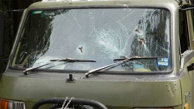 A star-picket was used to smash the windscreen and passenger window of the protester's truck.