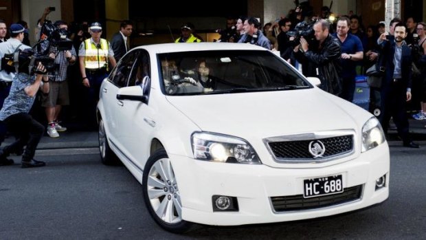 Ms Gillard leaves after giving evidence at the royal commission. 