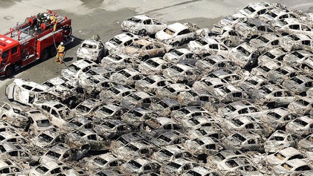 Cars at Hitachi port destroyed in the quake.