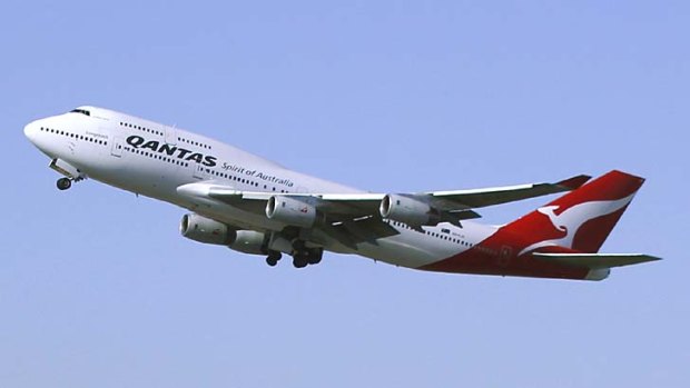 Getting an empty seat between two people on a long-haul flight is a bonus: Qantas 747.