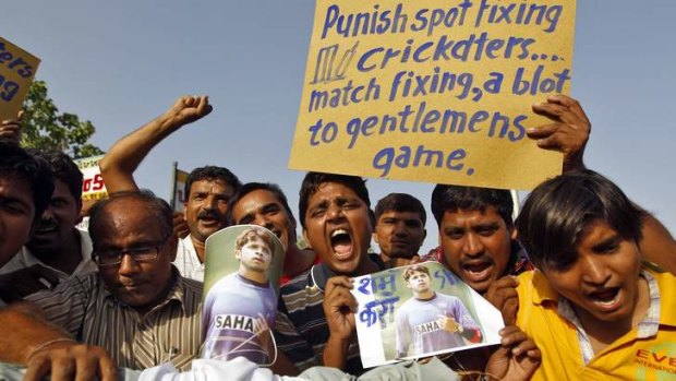 Anger: Demonstrators in Ahmedabad make their feelings known.