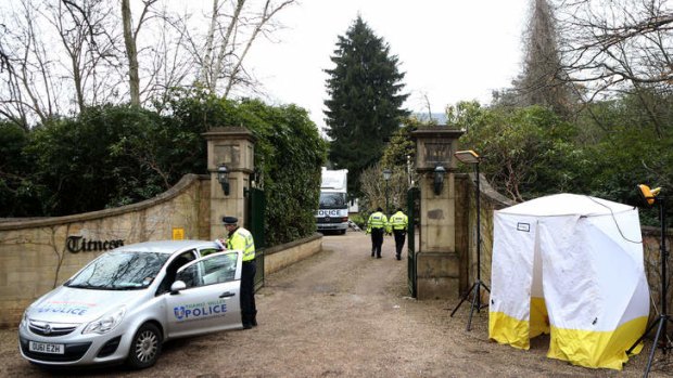 Police outside the gates of Boris Berezovsky's mansion in Sunningdale near Ascot after his death last month.