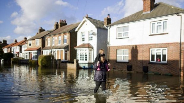 Under water: A street in Egham in Surrey, south-east England.