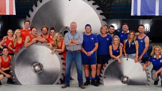 Challenge: Scott Cam, centre, host of Channel Nine's new reality show Reno Rumble, with the two teams of contestants.