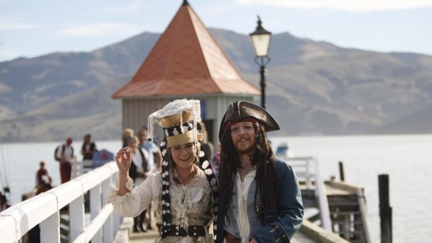 Trailblazers: Bride Marianna Fenn and bridegroom Toby Ricketts stand on a jetty in Akaroa harbour.