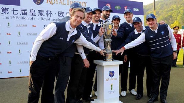 The European team celebrates after winning the Royal Trophy golf tournament at Dragon Lake Golf Club in Guangzhou on Sunday.