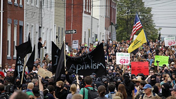Demonstrators march in Pittsburgh before the start of the US city's G20 summit.