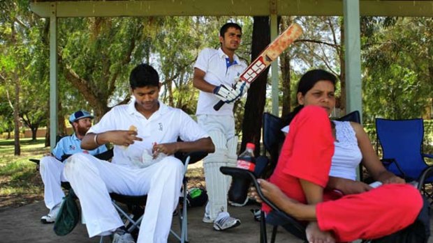 Team spirit ... from left, Brad Watts, Sabharinath Dhillon, Sohan Singh and Manider Kaur at a Churches Cricket Association match.