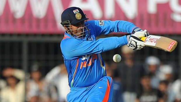 Virender Sehwag in full flight during his record-breaking 219 against the West Indies in Indore yesterday.