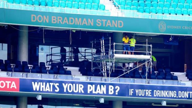 Cutting it fine: Workers were flat out on Thursday getting the new Bradman and Noble stands ready for the fifth Ashes Test at the SCG.
