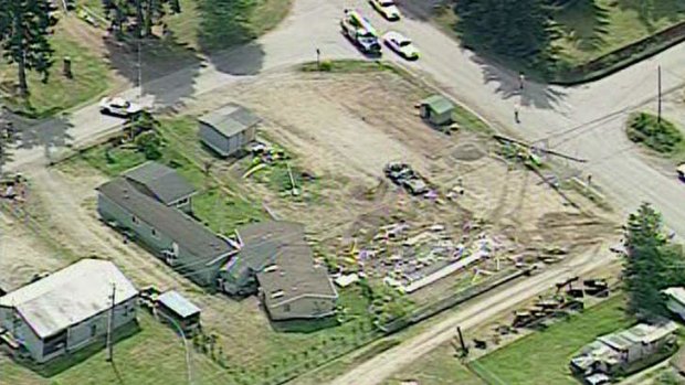 Moving house: the wreckage left after Barry Swegle allegedly took his bulldozer to a neighbour's house.